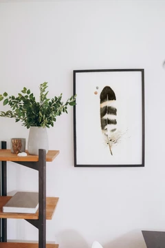 Image of a feather watercolor painting by Shayna Larsen, originals & prints available