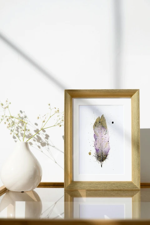 Image of a feather watercolor painting by Shayna Larsen, originals & prints available