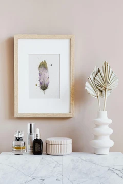 Image of a feather watercolor painting by Shayna Larsen, originals & prints available