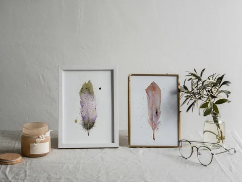 Image of a feather watercolor painting by Shayna Larsen, originals & prints available