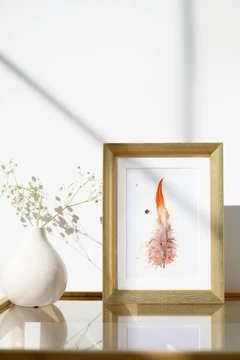 Image of a feather watercolor painting by Shayna Larsen, originals & prints available