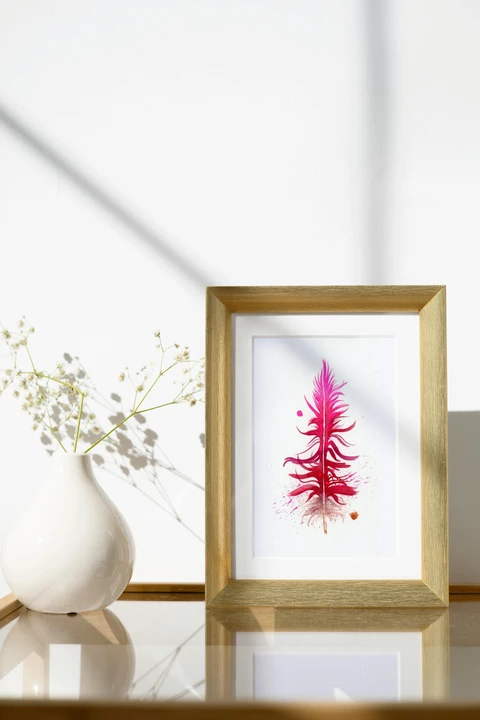 Image of a feather watercolor painting by Shayna Larsen, originals & prints available