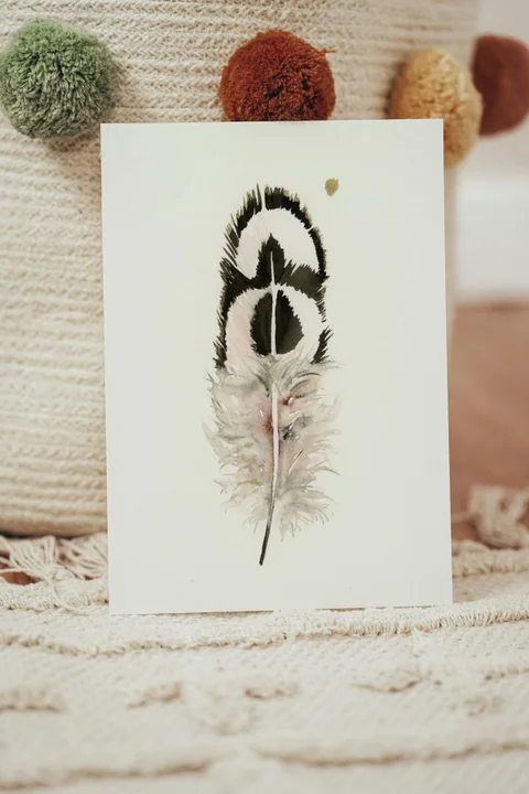 Image of a feather watercolor painting by Shayna Larsen, originals & prints available