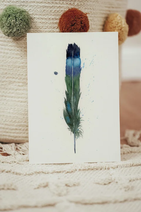 Image of a feather watercolor painting by Shayna Larsen, originals & prints available