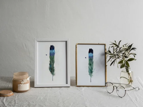Image of a feather watercolor painting by Shayna Larsen, originals & prints available