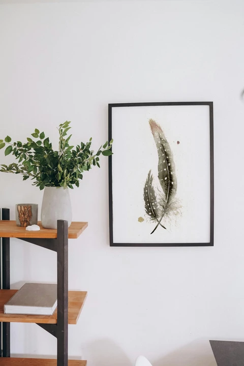Image of a feather watercolor painting by Shayna Larsen, originals & prints available