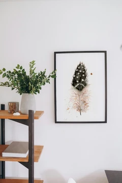 Image of a feather watercolor painting by Shayna Larsen, originals & prints available