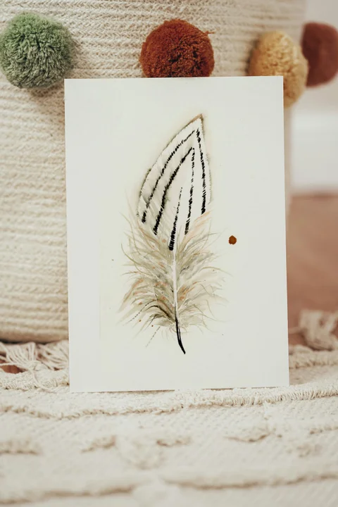 Image of a feather watercolor painting by Shayna Larsen, originals & prints available