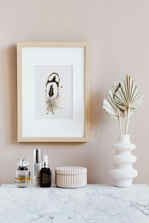 Image of a feather watercolor painting by Shayna Larsen, originals & prints available