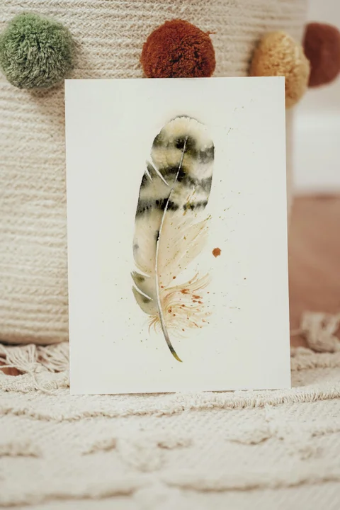 Image of a feather watercolor painting by Shayna Larsen, originals & prints available