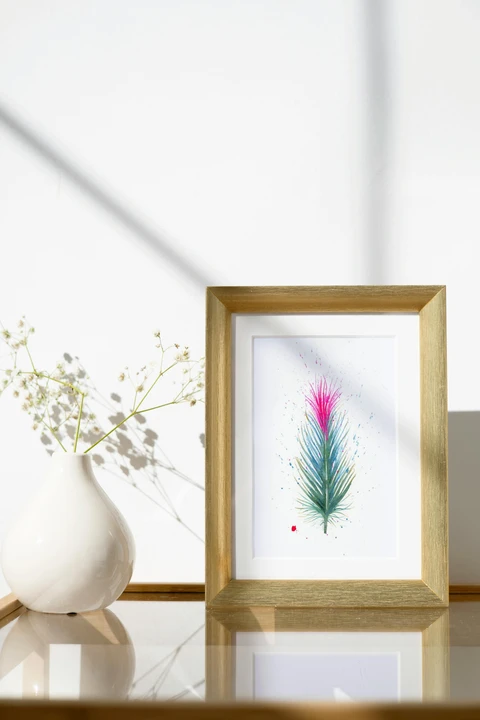 Image of a feather watercolor painting by Shayna Larsen, originals & prints available