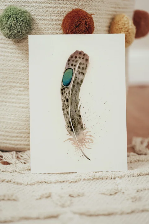 Image of a feather watercolor painting by Shayna Larsen, originals & prints available