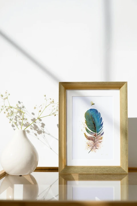 Image of a feather watercolor painting by Shayna Larsen, originals & prints available