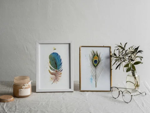 Image of a feather watercolor painting by Shayna Larsen, originals & prints available