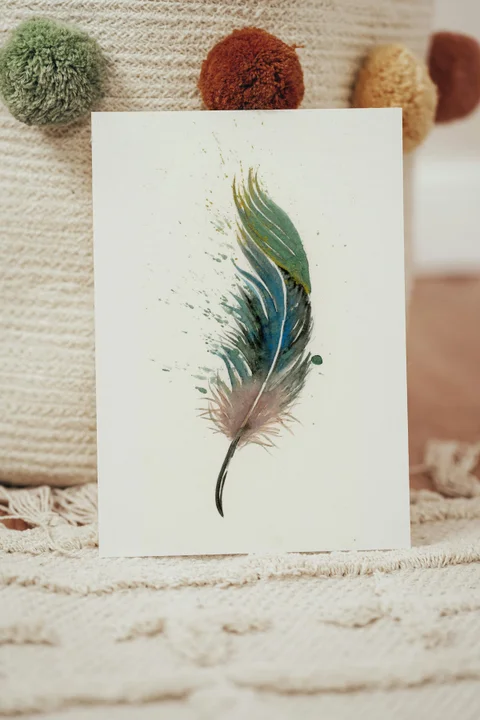 Image of a feather watercolor painting by Shayna Larsen, originals & prints available