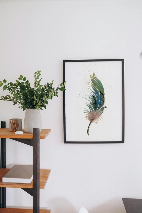 Image of a feather watercolor painting by Shayna Larsen, originals & prints available