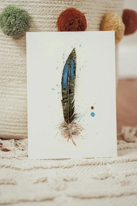 Image of a feather watercolor painting by Shayna Larsen, originals & prints available