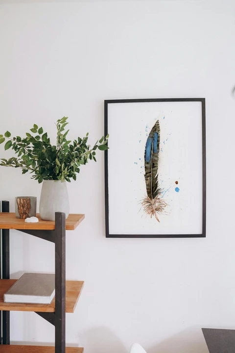 Image of a feather watercolor painting by Shayna Larsen, originals & prints available