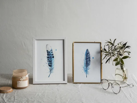 Image of a feather watercolor painting by Shayna Larsen, originals & prints available