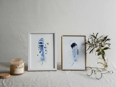 Image of a feather watercolor painting by Shayna Larsen, originals & prints available