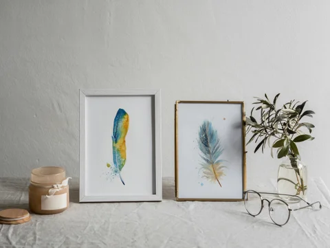 Image of a feather watercolor painting by Shayna Larsen, originals & prints available
