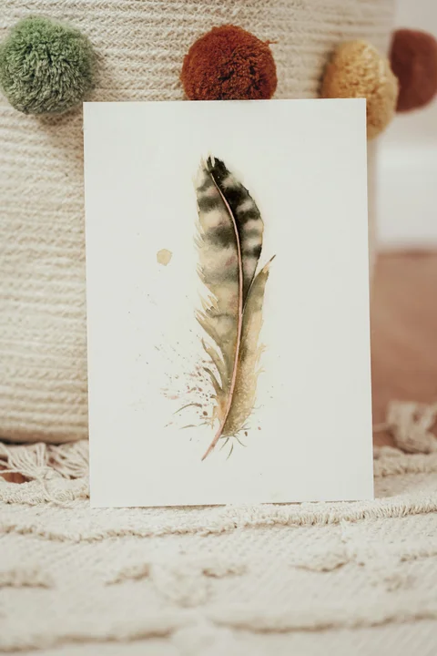 Image of a feather watercolor painting by Shayna Larsen, originals & prints available