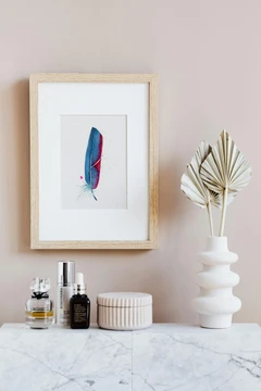 Image of a feather watercolor painting by Shayna Larsen, originals & prints available