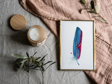 Image of a feather watercolor painting by Shayna Larsen, originals & prints available