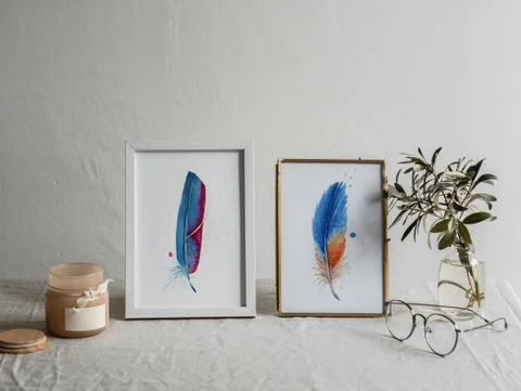 Image of a feather watercolor painting by Shayna Larsen, originals & prints available