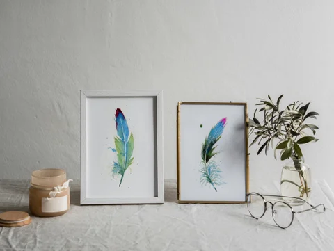 Image of a feather watercolor painting by Shayna Larsen, originals & prints available