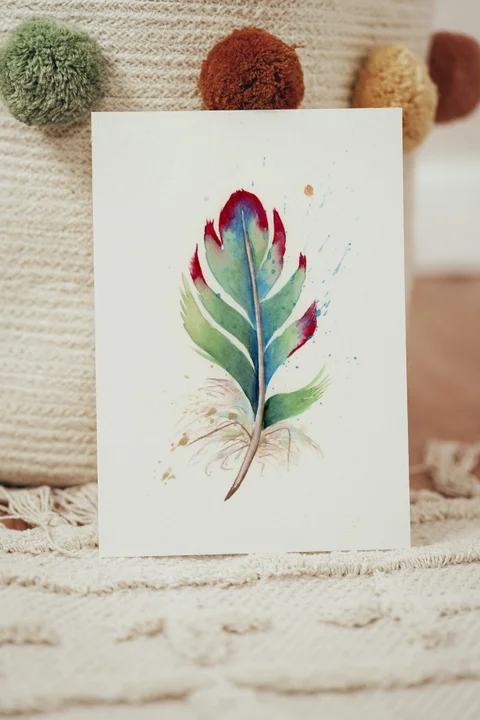 Image of a feather watercolor painting by Shayna Larsen, originals & prints available