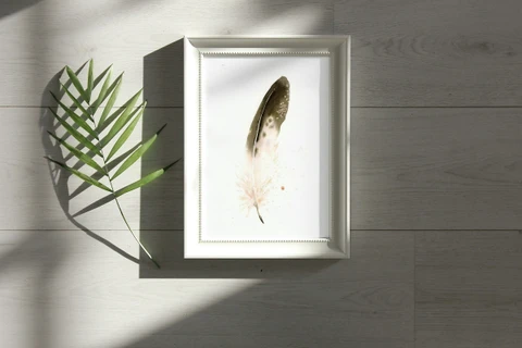 Image of a feather watercolor painting by Shayna Larsen, originals & prints available