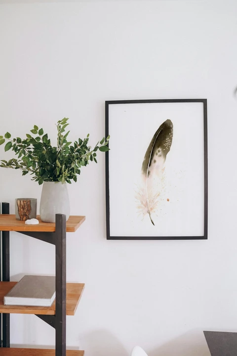 Image of a feather watercolor painting by Shayna Larsen, originals & prints available