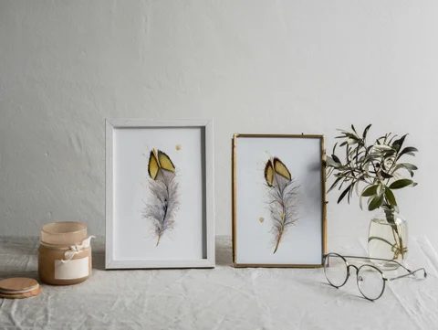 Image of a feather watercolor painting by Shayna Larsen, originals & prints available