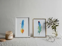 Image of a feather watercolor painting by Shayna Larsen, originals & prints available
