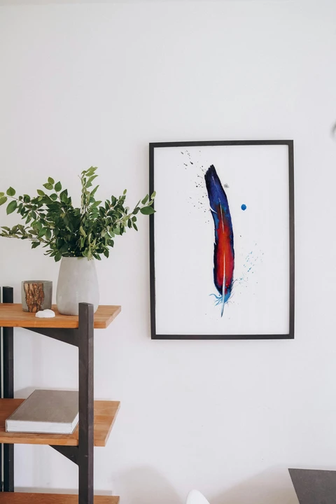 Image of a feather watercolor painting by Shayna Larsen, originals & prints available