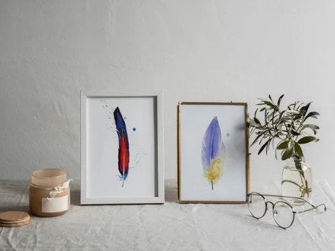 Image of a feather watercolor painting by Shayna Larsen, originals & prints available