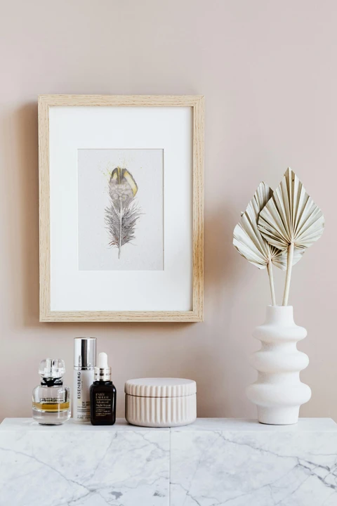 Image of a feather watercolor painting by Shayna Larsen, originals & prints available