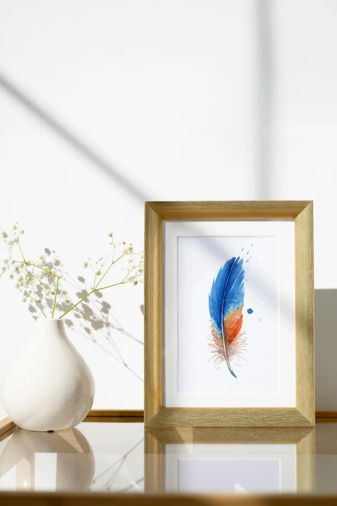 Image of a feather watercolor painting by Shayna Larsen, originals & prints available