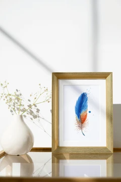 Image of a feather watercolor painting by Shayna Larsen, originals & prints available