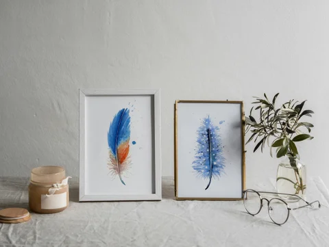 Image of a feather watercolor painting by Shayna Larsen, originals & prints available