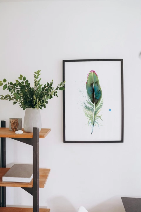 Image of a feather watercolor painting by Shayna Larsen, originals & prints available
