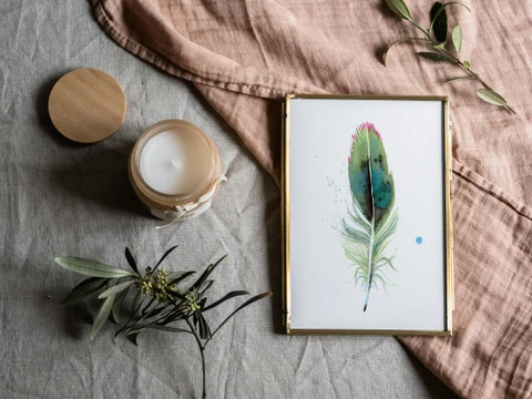 Image of a feather watercolor painting by Shayna Larsen, originals & prints available
