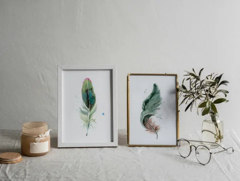 Image of a feather watercolor painting by Shayna Larsen, originals & prints available