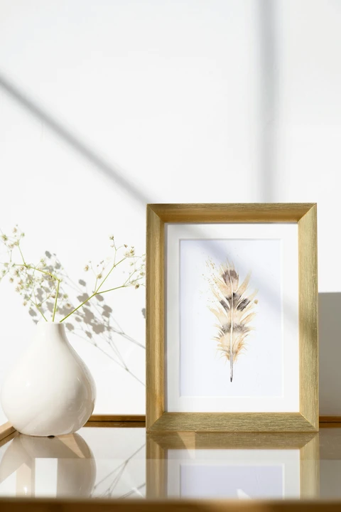 Image of a feather watercolor painting by Shayna Larsen, originals & prints available