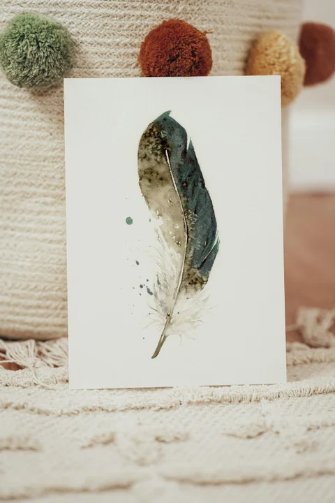 Image of a feather watercolor painting by Shayna Larsen, originals & prints available