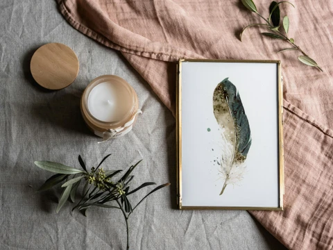 Image of a feather watercolor painting by Shayna Larsen, originals & prints available