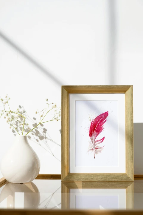 Image of a feather watercolor painting by Shayna Larsen, originals & prints available