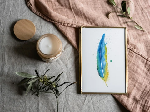 Image of a feather watercolor painting by Shayna Larsen, originals & prints available