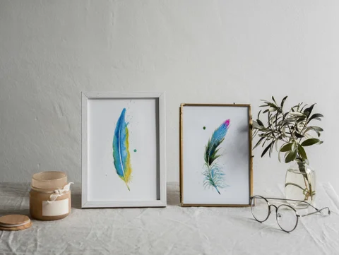 Image of a feather watercolor painting by Shayna Larsen, originals & prints available
